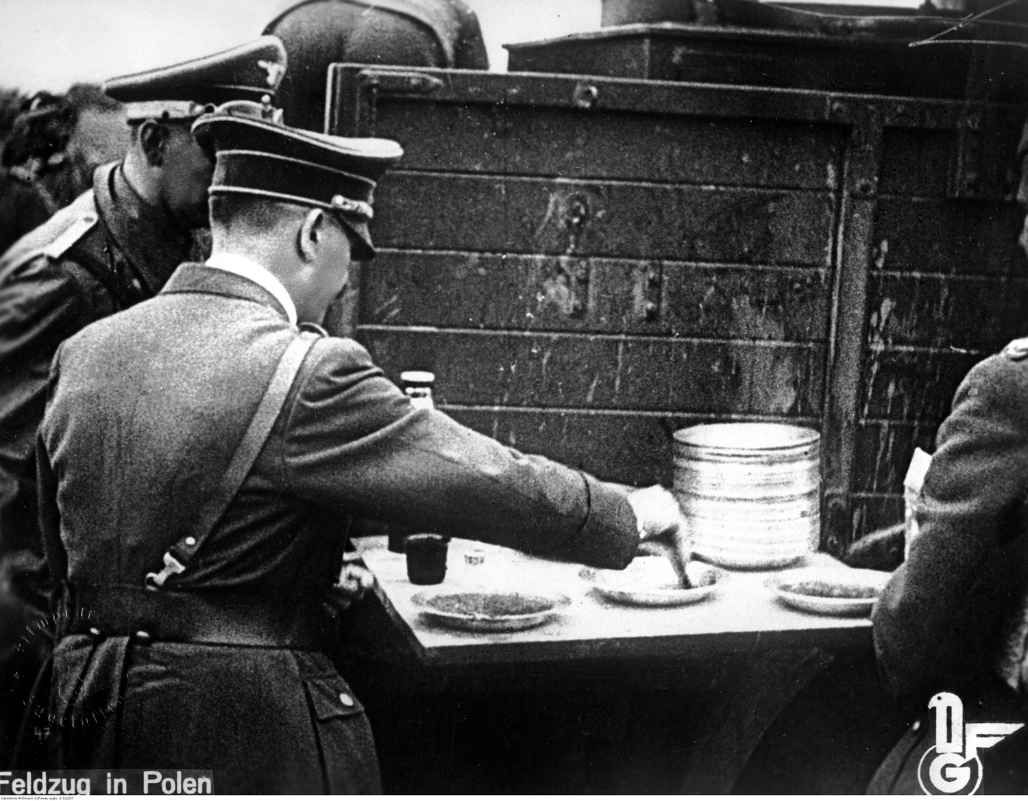 Adolf Hitler taking a lunch break at the field kitchen near the front line in Poland